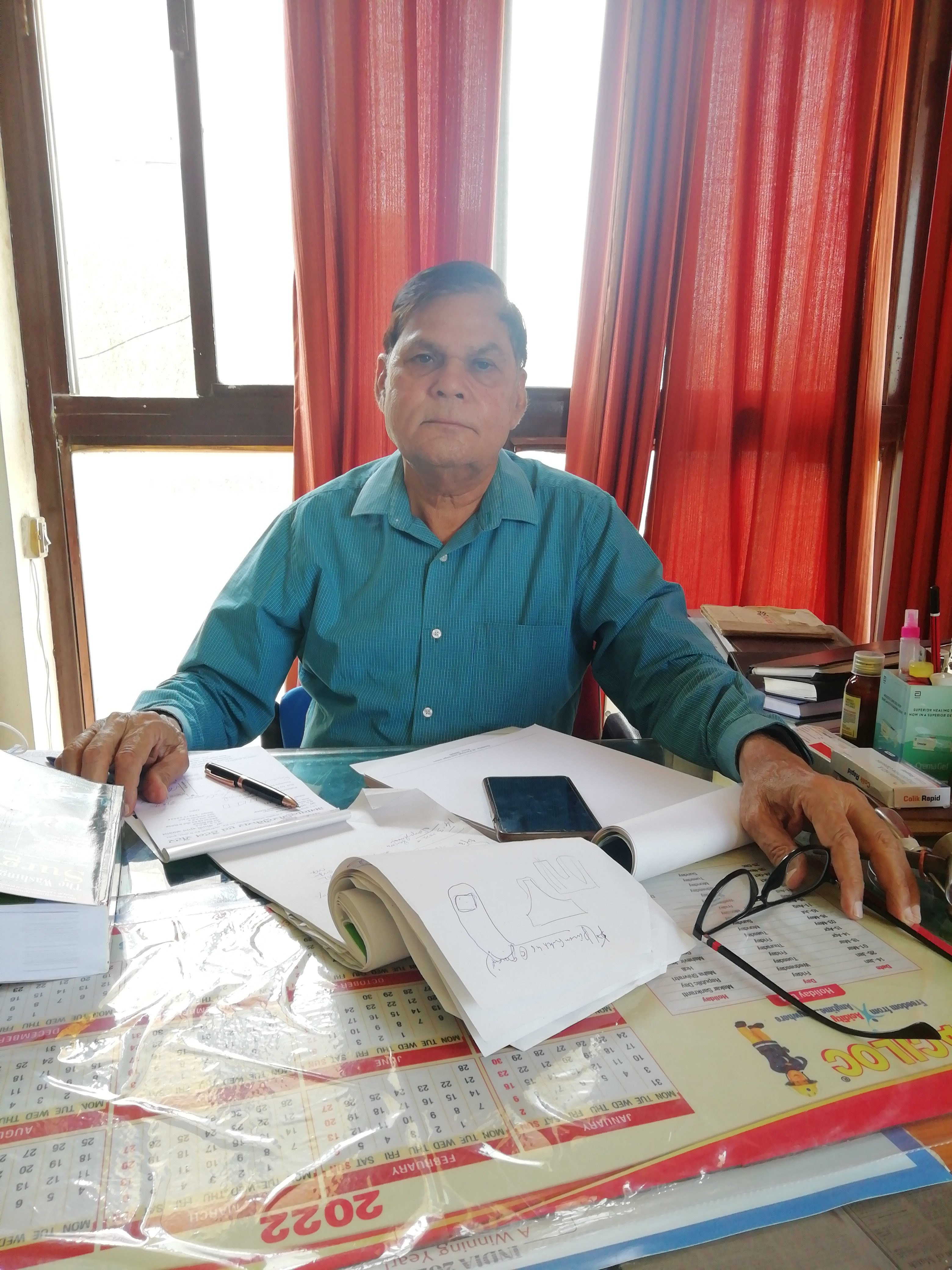Dr. Pramod Sharma
