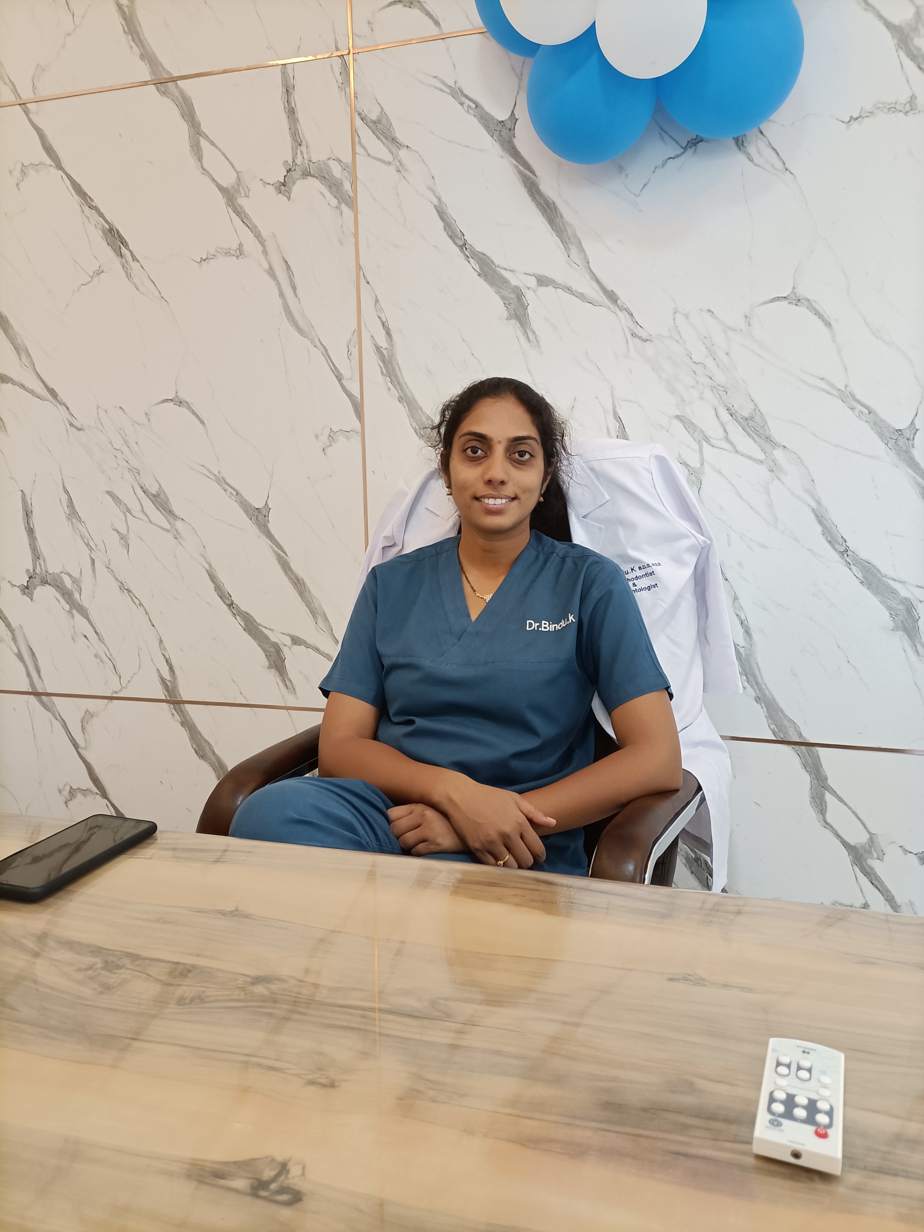 Dr. BINDU K