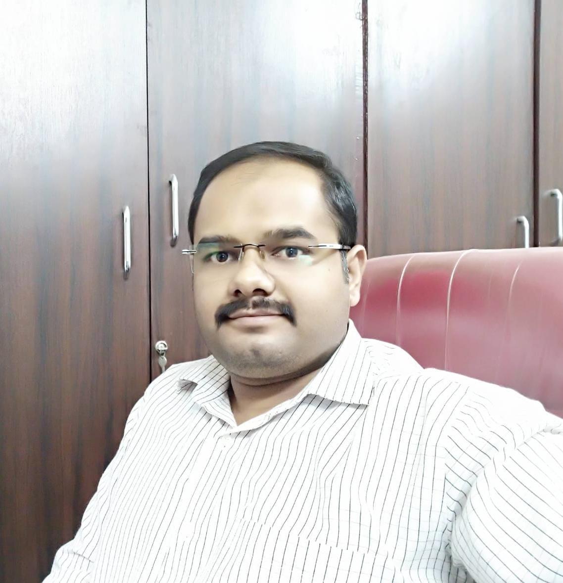 Dr. Bharat Divate