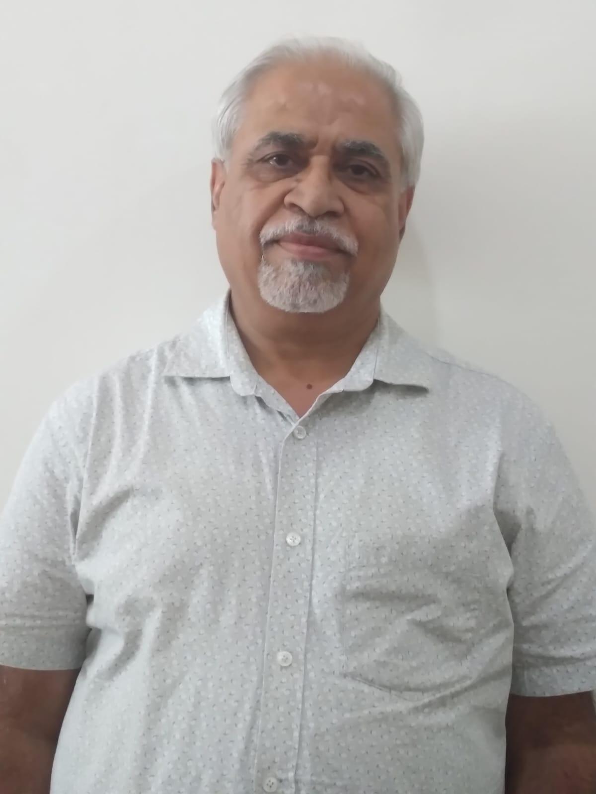 Dr. Dinesh Chawla