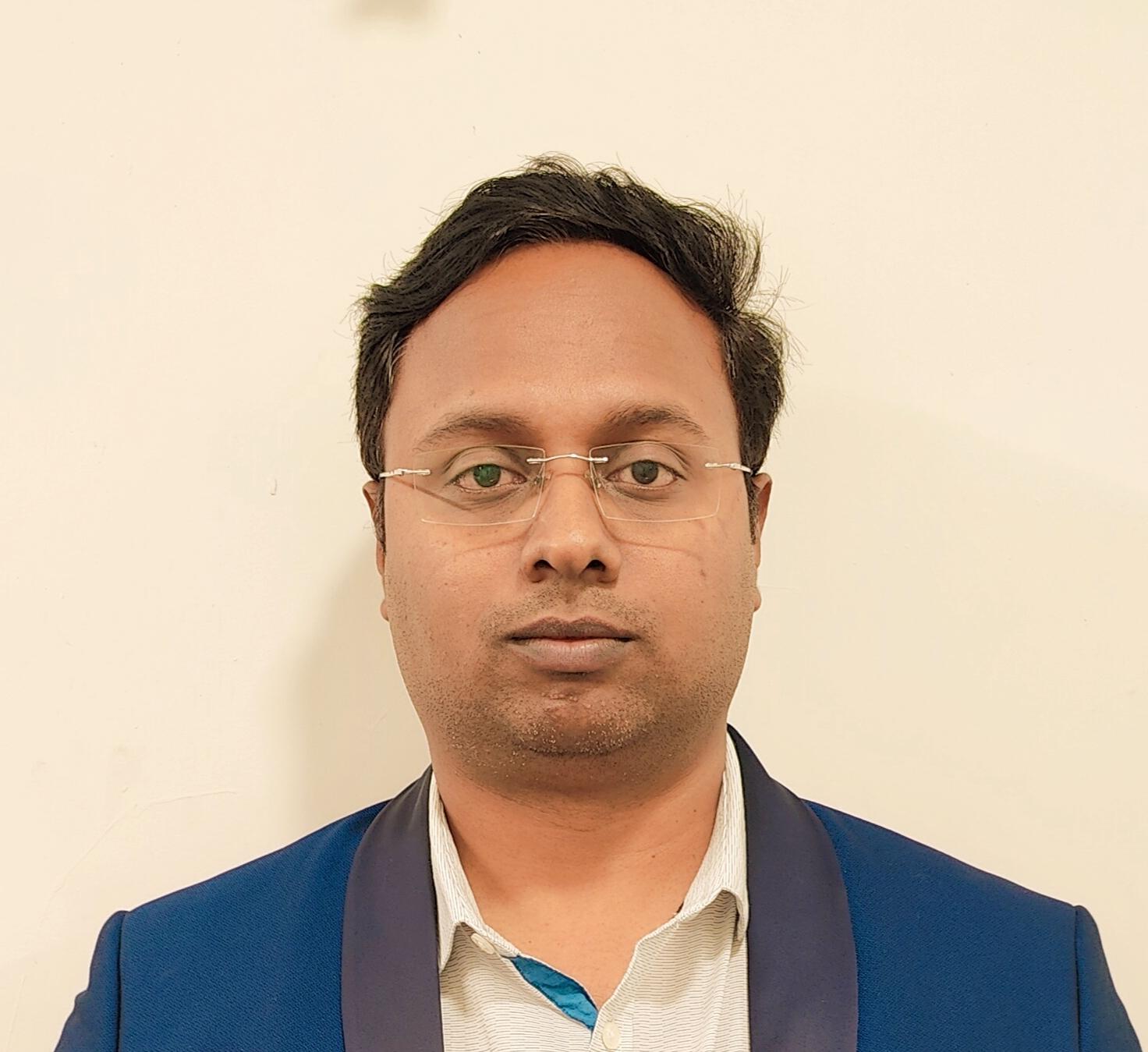 Dr. Akshay T M