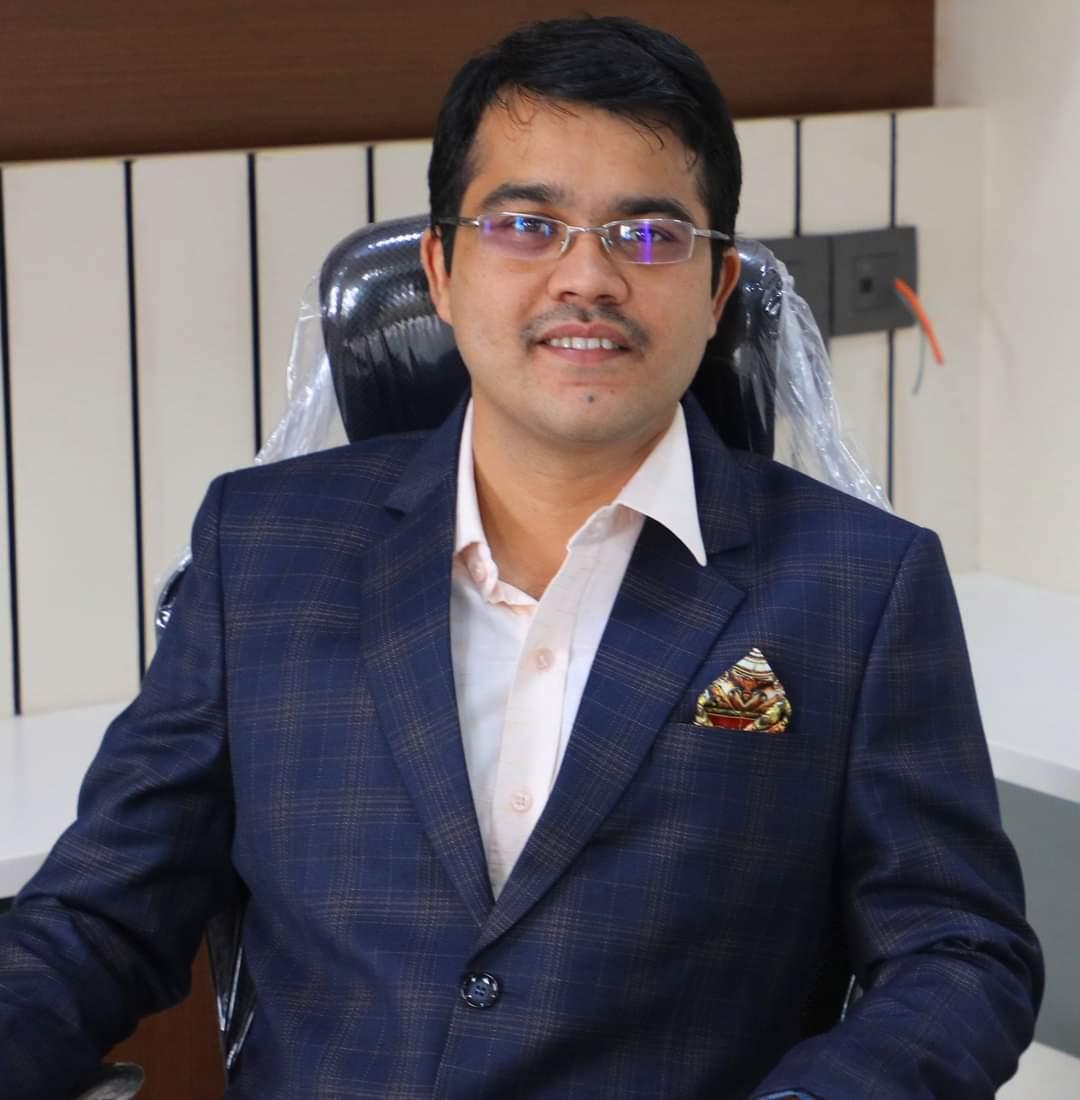 Dr. Kedar Takalkar