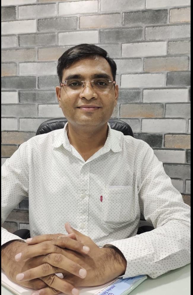 Dr. Anand Lade