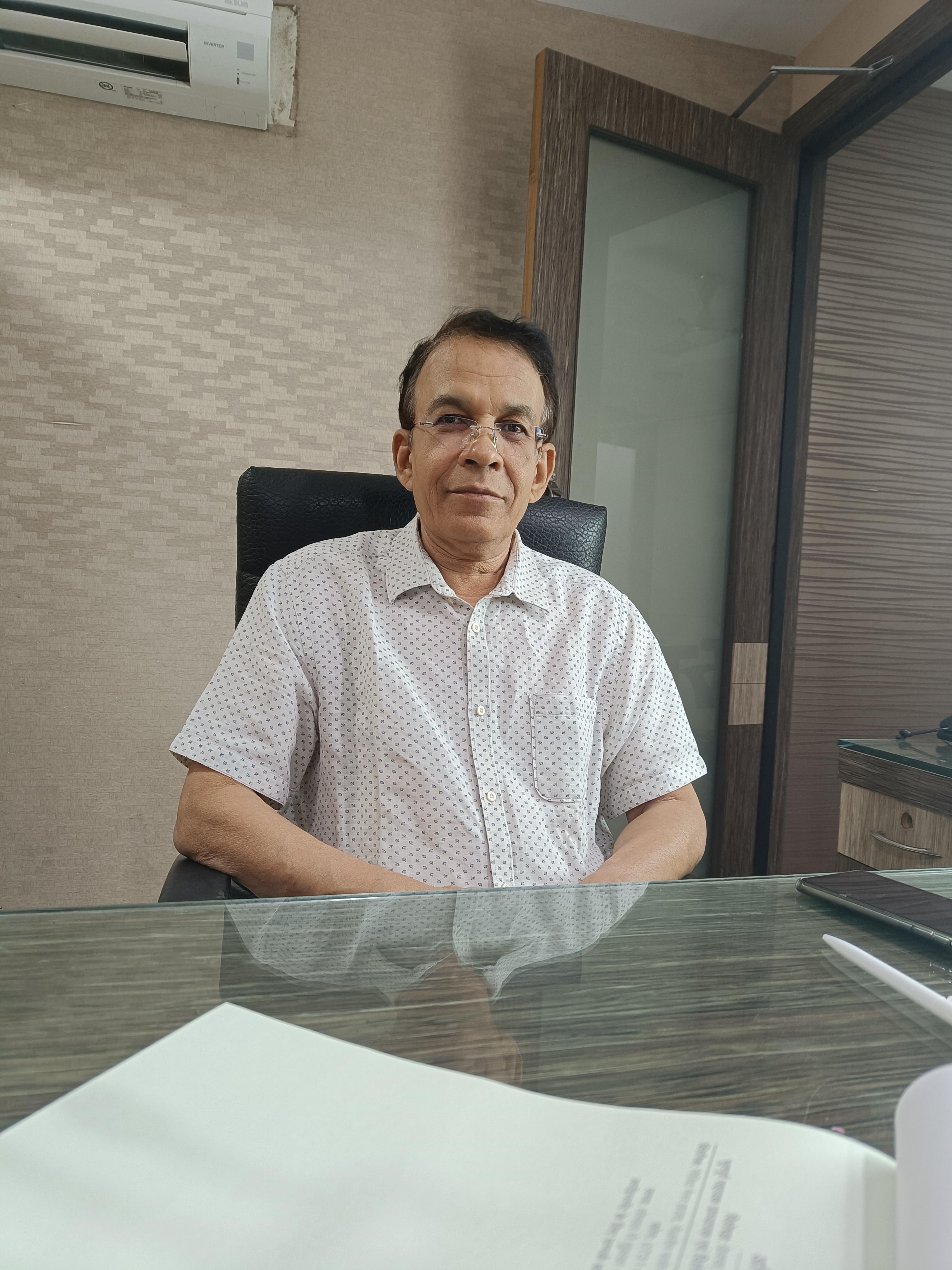 Dr. Asim Negi