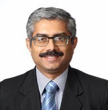 Dr. Mohan Menon