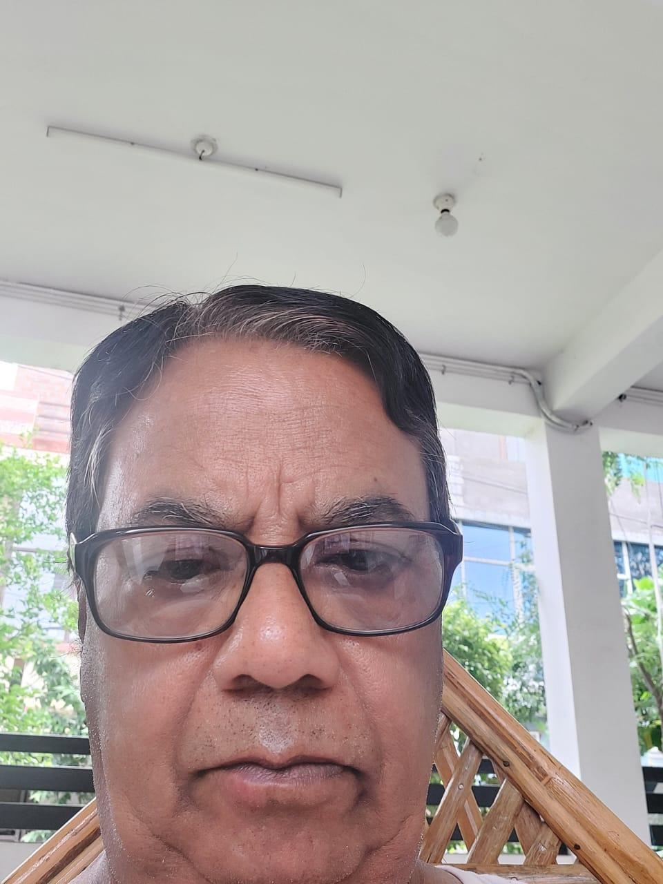 Dr. SUBHASH GHOSALKAR