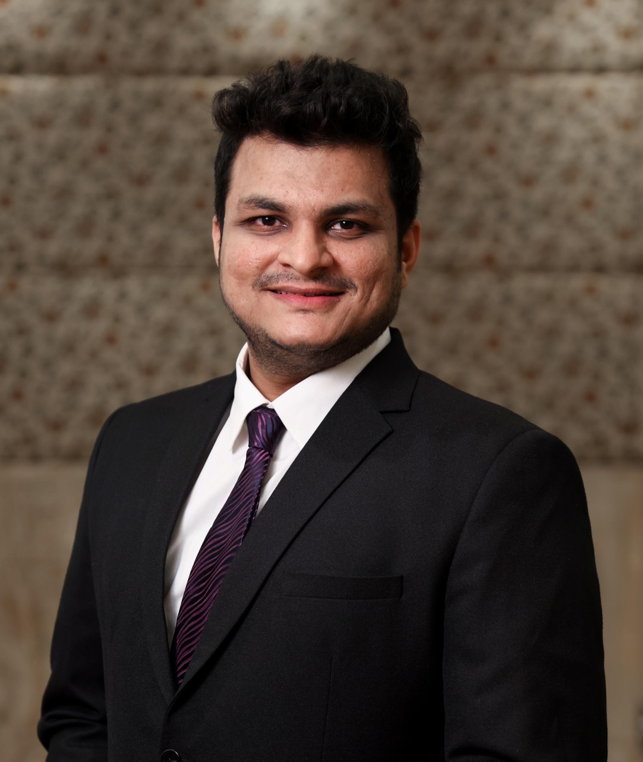 Dr. Anuj Doshi