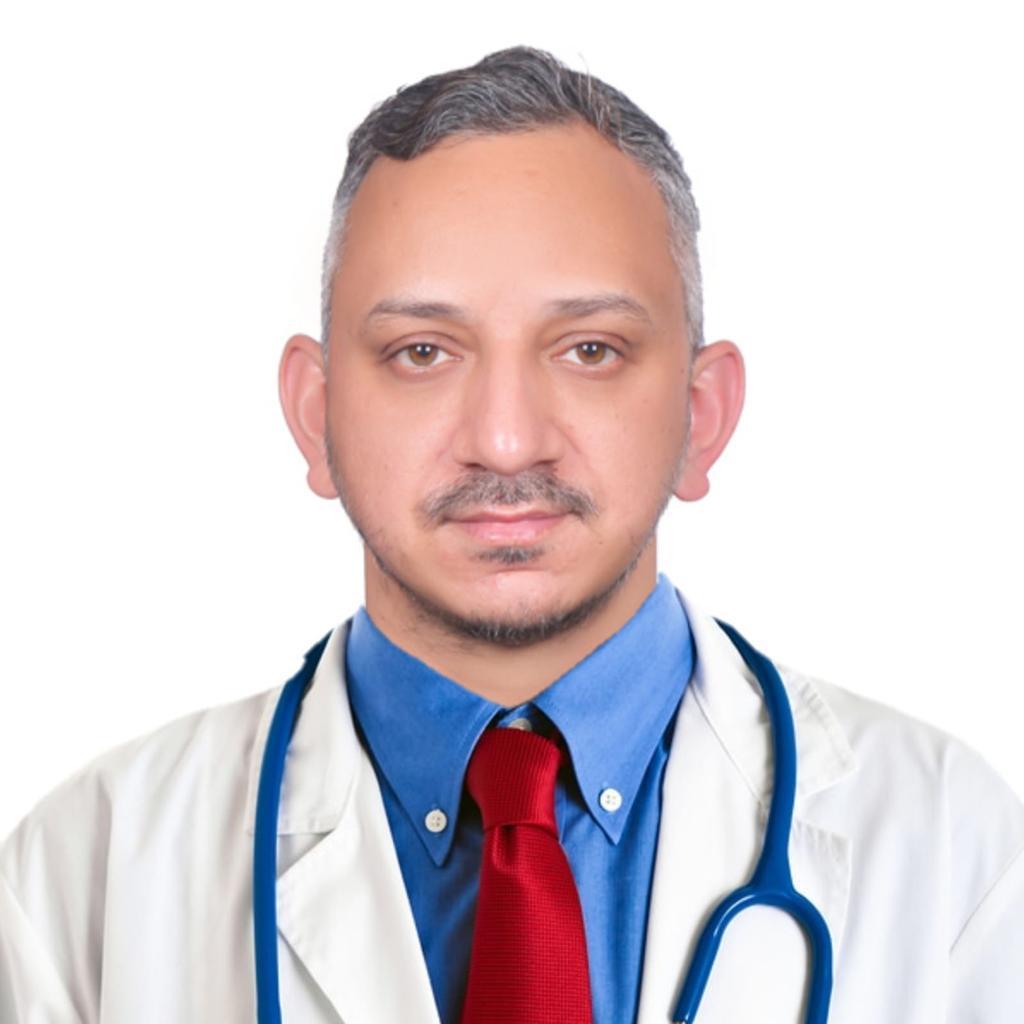 Dr. Dinesh Thakur