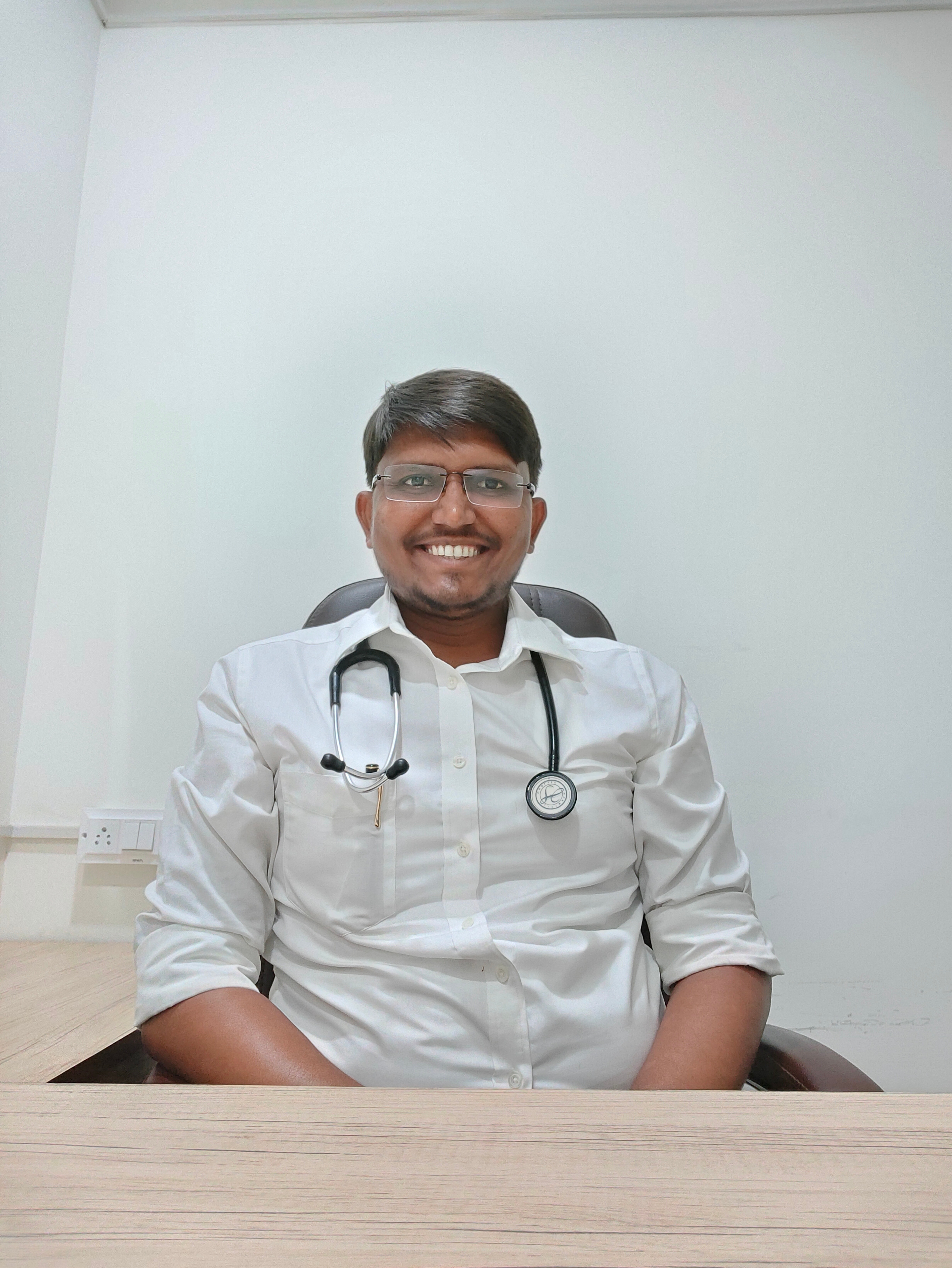 Dr. Dhrumin Prajapati