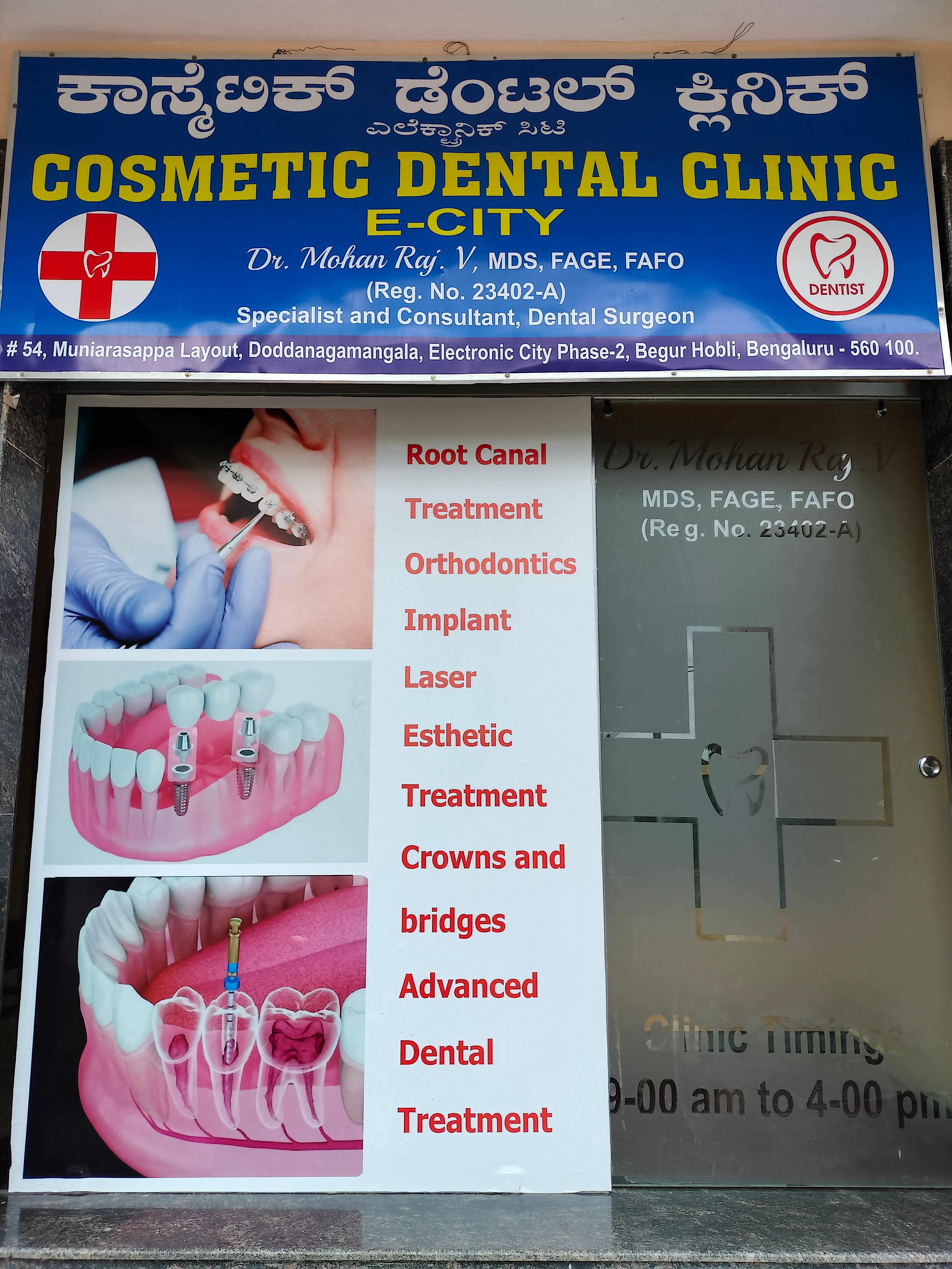 Clinic signage photo of Cosmetic Dental clinic -E City - Photo 1 at Not Available 560100