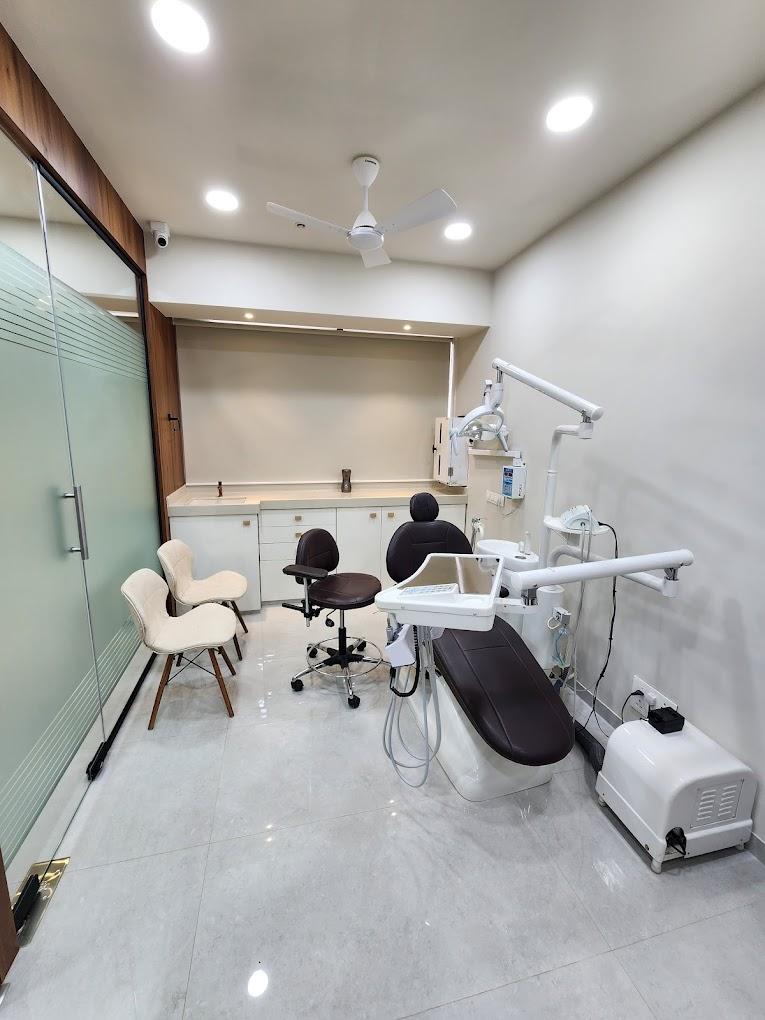 Clinic signage photo of Smile Solutions Advanced Dental Care and Implant Center - Photo 1 at mumbai 400091
