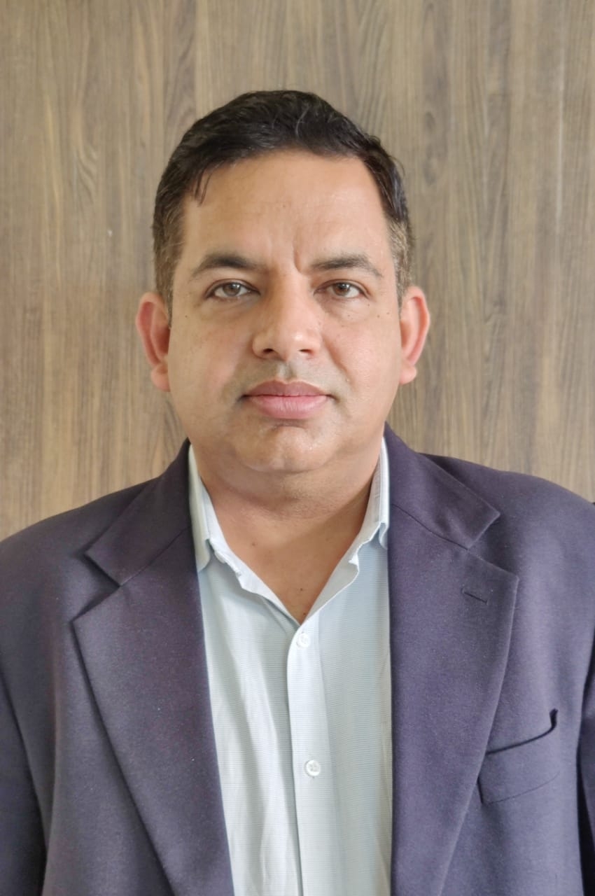 Dr. Adesh Sharma